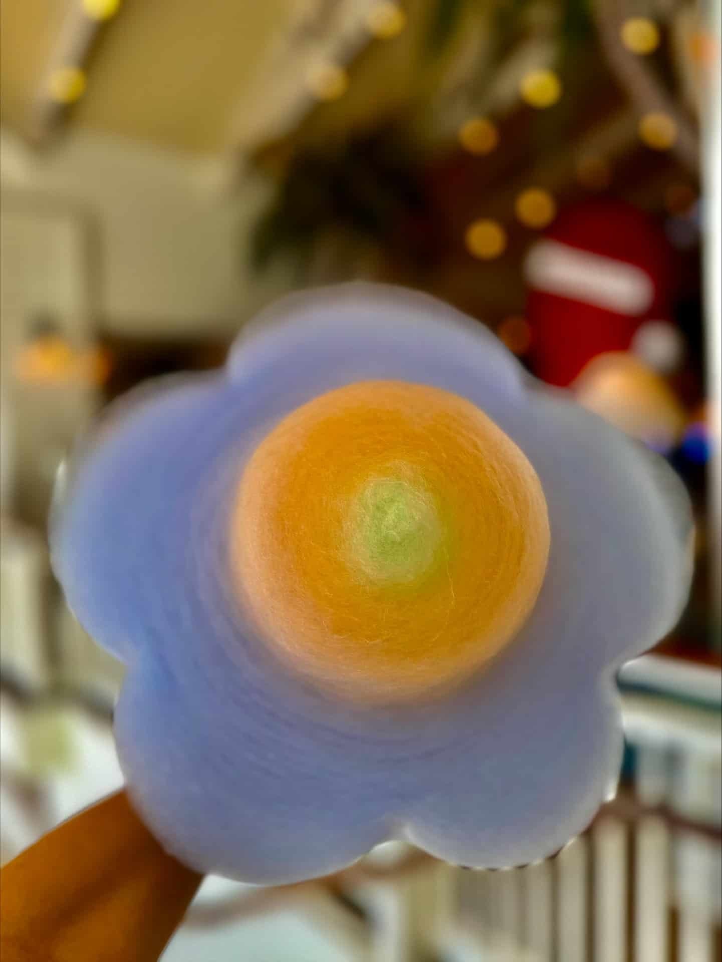 Cotton candy in the shape of a flower from Margaritaville Resort Orlando's cotton candy ATM